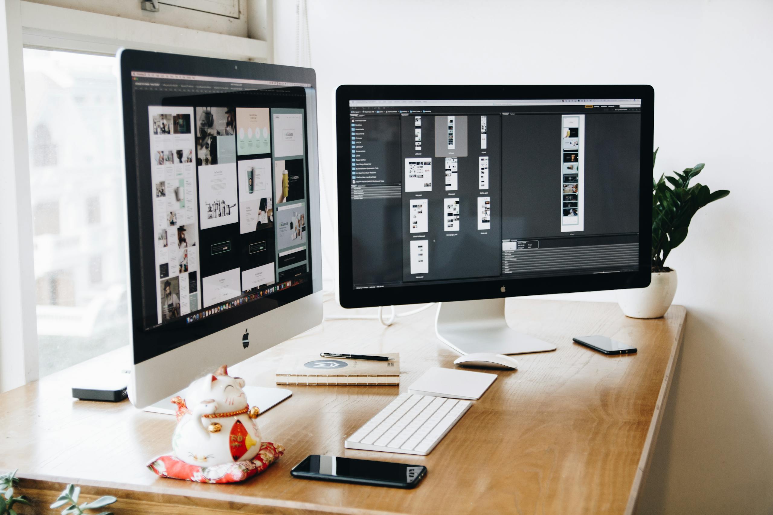 Zesty Digital Studio: Work with us | A well-organized design workspace with dual monitors and design software on display.