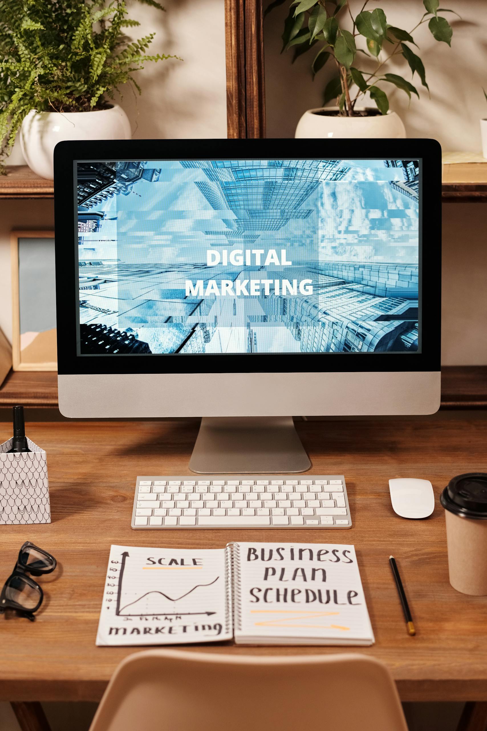 Work with Zesty Digital Studio | Contemporary office setup featuring digital marketing strategy on a computer screen, ideal for business technology themes.